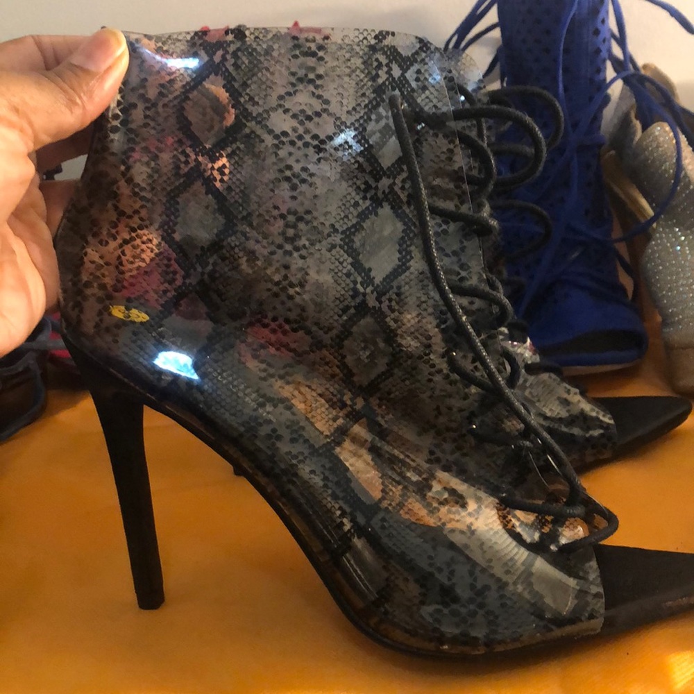 Snakeskin print plastic booties